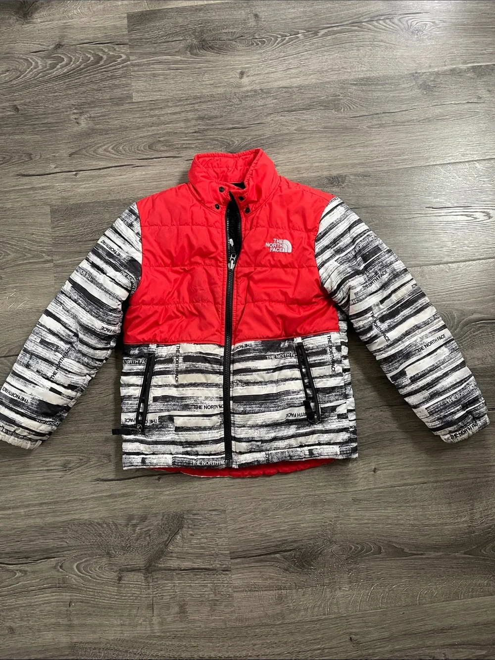 The North Face Kids Red Top with Black & White Striped Puffer Jacket